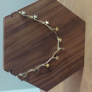 Gold star pendent necklace